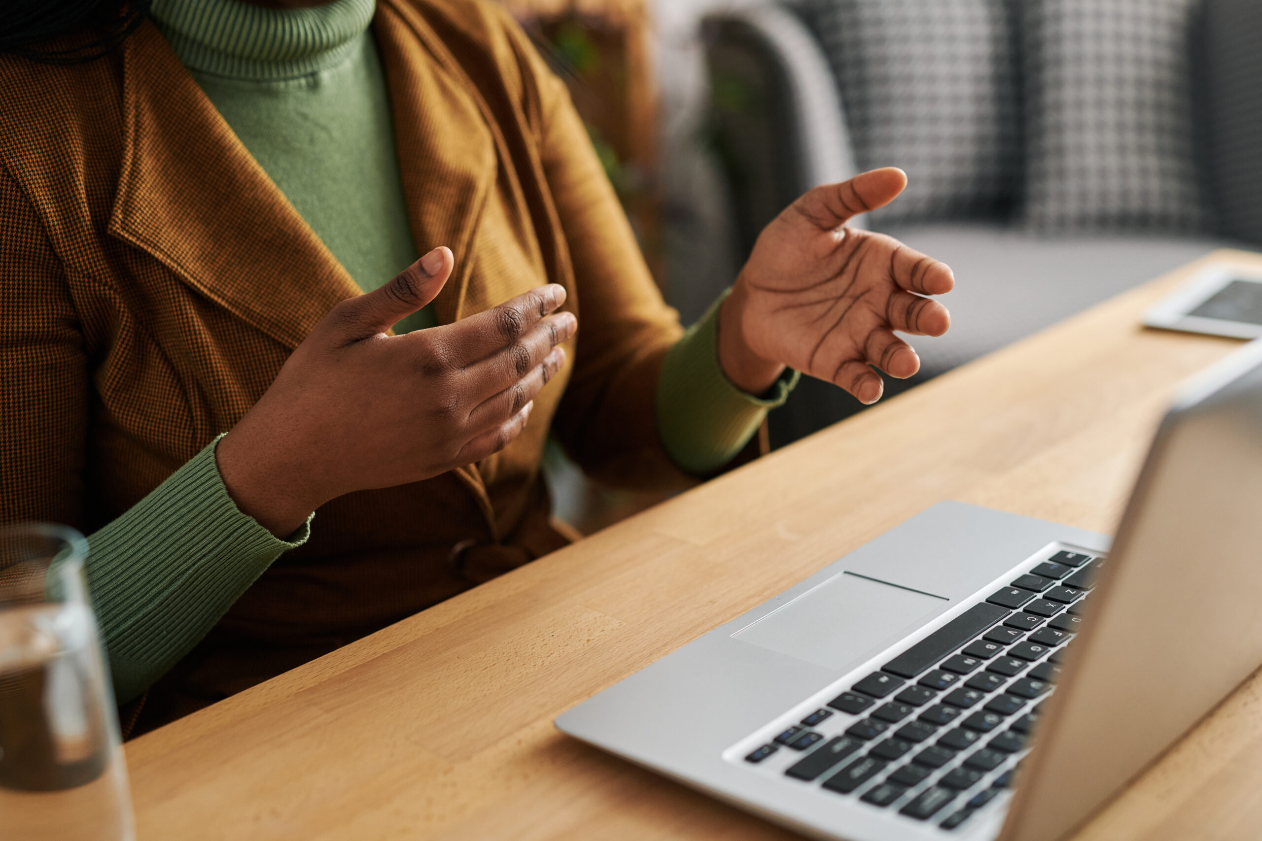 Hands of young female psychoanalyst explaining something to patient Consultation